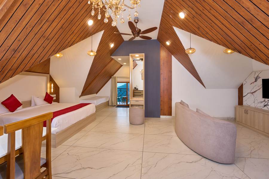 A-Frame Luxury Suite bedroom with vaulted wood ceiling