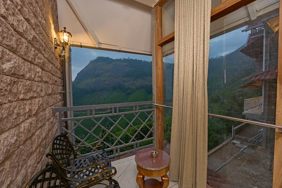 A-Frame Luxury Suite private balcony with mountain view