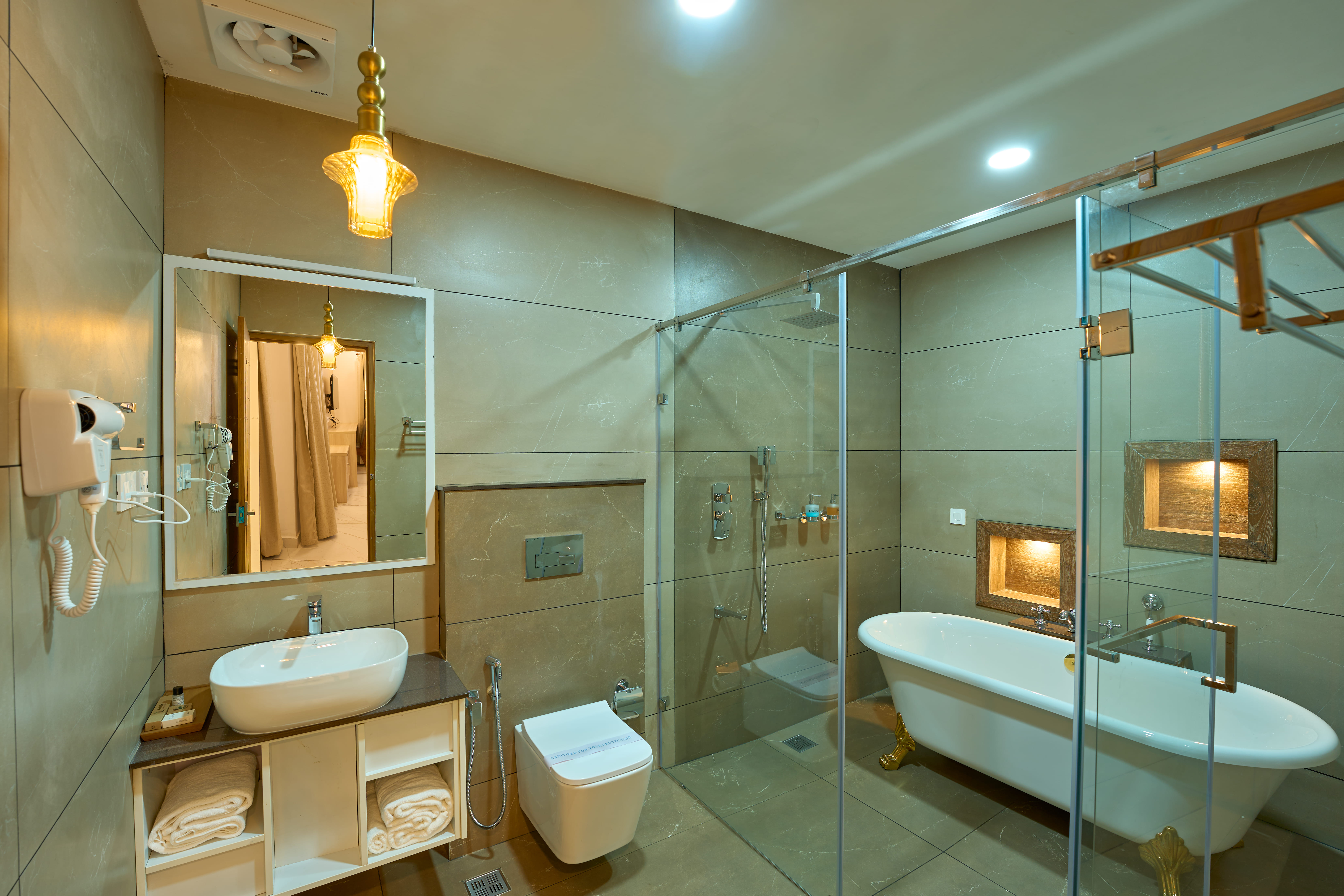Plantation Luxury Room with Bathtub — bathroom with freestanding tub and rain shower